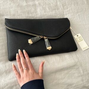 Urban outfitters brand new black leather clutch